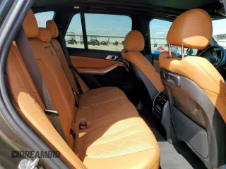 2023 BMW X5 xDrive40i with VIN 5UXCR6C01P9P27041, listed as a Copart auction lot 59009585 with 45,568 mi miles and Salvage title. Bid and sale history available at DreamBid. Image 11.