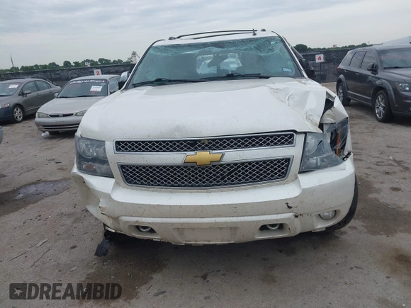 2013 Chevrolet Suburban LTZ with VIN 1GNSCKE00DR209381, listed as a IAAI auction lot 42469271 with Not provided miles and . Bid and sale history available at DreamBid. Image 12.