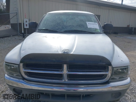 1997 Dodge Dakota with VIN 1B7GG23X0VS136400, listed as a IAAI auction lot 41642514 with 223,696 mi miles. Bid and sale history available at carsss.com. Image 6.