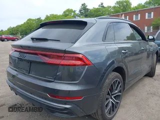 2021 Audi Q8 Premium Plus with VIN WA1EVAF14MD036327, listed as a IAAI auction lot 42237144 with 59,157 mi miles and . Bid and sale history available at DreamBid. Image 4.