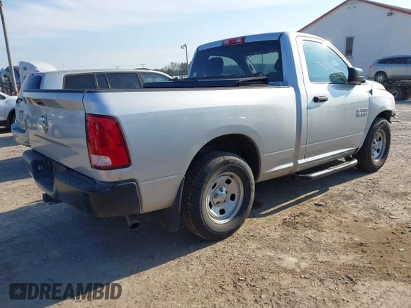 2014 Ram 1500 Express with VIN 3C6JR6AG5EG223055, listed as a IAAI auction lot 41707372 with 97,353 mi miles and . Bid and sale history available at DreamBid. Image 4.