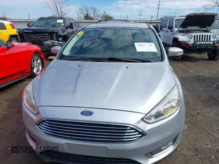 2017 Ford Focus Titanium with VIN 1FADP3N26HL309903, listed as a IAAI auction lot 41642306 with 107,762 mi miles and . Bid and sale history available at carsss.com. Image 12.