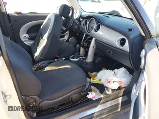 2003 MINI Hardtop with VIN WMWRC33433TE14150, listed as a IAAI auction lot 41313860 with 209,684 mi miles and . Bid and sale history available at DreamBid. Image 5.