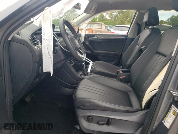 2023 Volkswagen Tiguan SE с VIN 3VVMB7AX7PM008282, выставлен на аукционе Copart как лот 55639525 с пробегом 32 490 миль миль и Списание • Salvage title. История ставок и продаж доступна на DreamBid. Изображение 7.