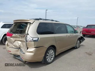 2013 Toyota Sienna XLE with VIN 5TDDK3DC4DS055796, listed as a IAAI auction lot 41993530 with 256,735 mi miles and . Bid and sale history available at DreamBid. Image 4.