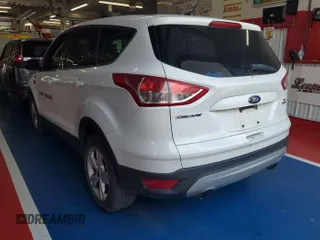 2013 Ford Escape SE with VIN 1FMCU9G92DUD72105, listed as a IAAI auction lot 42731657 with 213,477 mi miles and . Bid and sale history available at DreamBid. Image 5.