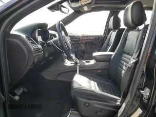 2021 Jeep Grand Cherokee 80th Anniversary z VIN 1C4RJEBG1MC844595, wystawiony jako Copart lot #54899195 z przebiegiem 19 287 mil mil oraz Szkoda całkowita • Salvage title. Historia ofert i sprzedaży dostępna na DreamBid. Obrazek 7.