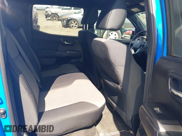 2021 Toyota Tacoma SR z VIN 3TMCZ5AN8MM374398, wystawiony jako IAAI lot #42297138 z przebiegiem 87 205 mil mil oraz . Historia ofert i sprzedaży dostępna na DreamBid. Obrazek 8.