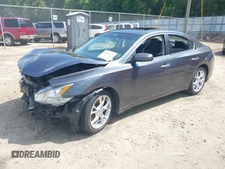 2013 Nissan Maxima SV with VIN 1N4AA5AP7DC805658, listed as a IAAI auction lot 42453972 with 198,641 mi miles and . Bid and sale history available at DreamBid. Image 2.