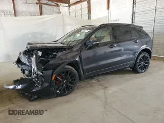 2023 Cadillac XT4 AWD Sport with VIN 1GYFZFR41PF103650, listed as a Copart auction lot 59321355 with 27,092 mi miles and Salvage title. Bid and sale history available at DreamBid. Image 1.