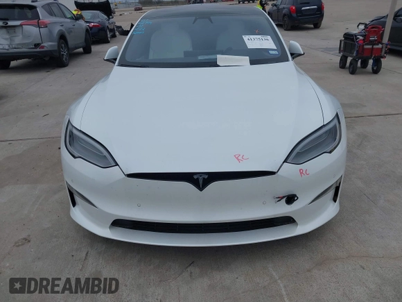 2021 Tesla Model S Plaid z VIN 5YJSA1E64MF452744, wystawiony jako IAAI lot #41375136 z przebiegiem Nie podano mil oraz . Historia ofert i sprzedaży dostępna na DreamBid. Obrazek 11.