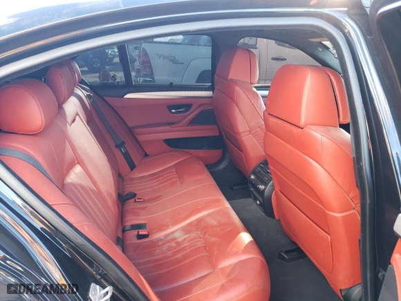 2016 BMW M5 with VIN WBSFV9C57GD595836, listed as a Copart auction lot 38796484 with 48,561 mi miles and Salvage Title. Bid and sale history available at carsss.com. Image 10.