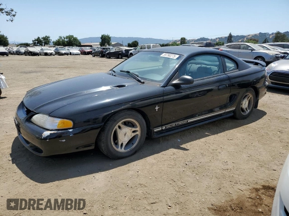 1997 Ford Mustang with VIN 1FALP4048VF172130, listed as a Copart auction lot 59790275 with 125,336 mi miles and Salvage title. Bid and sale history available at DreamBid. Image 1.