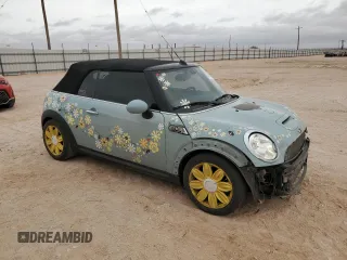 2014 MINI Convertible S with VIN WMWZP3C56ET707425, listed as a Copart auction lot 50894965 with 100,116 mi miles and Salvage Title. Bid and sale history available at DreamBid. Image 4.