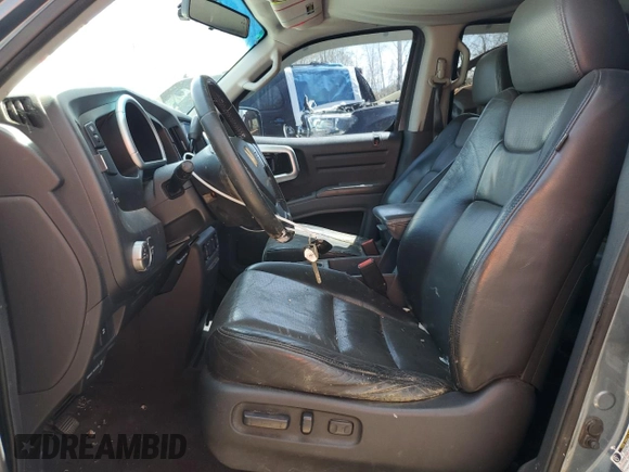2006 Honda Ridgeline RTL z VIN 2HJYK16536H527441, wystawiony jako Copart lot #44858284 z przebiegiem 210 982 mil mil oraz Czysty tytuł • Clean title. Historia ofert i sprzedaży dostępna na DreamBid. Obrazek 7.
