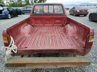 1992 Toyota Pickup DLX z VIN JT4RN93P4N5064218, wystawiony jako Copart lot #58095635 z przebiegiem 256 271 mil mil oraz Tytuł czysty. Historia ofert i sprzedaży dostępna na DreamBid. Obrazek 7.