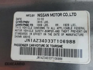 2003 Nissan 350Z Performance z VIN JN1AZ34D33T106988, wystawiony jako Copart lot #57933985 z przebiegiem 203 959 mil mil oraz Szkoda całkowita • Salvage title. Historia ofert i sprzedaży dostępna na DreamBid. Obrazek 12.