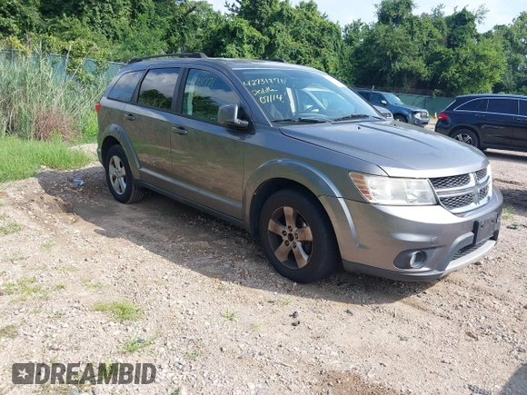 2012 Dodge Journey SXT with VIN 3C4PDCBG3CT310679, listed as a IAAI auction lot 42731771 with 165,928 mi miles and . Bid and sale history available at DreamBid. Image 1.