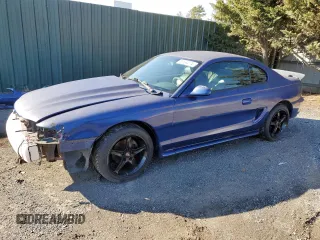 1997 Ford Mustang GT with VIN 1FALP42X9VF189929, listed as a Copart auction lot 85594074 with 138,848 mi miles and Salvage title. Bid and sale history available at DreamBid. Image 1.