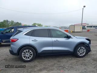 2022 Ford Escape SE z VIN 1FMCU0G61NUB15746, wystawiony jako IAAI lot #42107667 z przebiegiem 29 000 mil mil oraz . Historia ofert i sprzedaży dostępna na DreamBid. Obrazek 14.