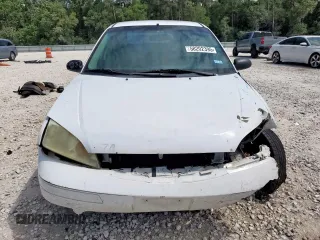 2007 Ford Focus S with VIN 1FAHP34NX7W225626, listed as a Copart auction lot 58202395 with 157,844 mi miles and Salvage title. Bid and sale history available at DreamBid. Image 5.