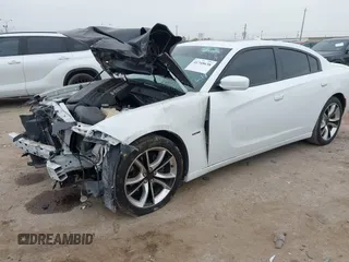 2015 Dodge Charger RT with VIN 2C3CDXCT7FH886214, listed as a IAAI auction lot 41748638 with 43,128 mi miles and . Bid and sale history available at DreamBid. Image 2.