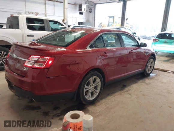 2015 Ford Taurus SEL with VIN 1FAHP2E82FG124009, listed as a IAAI auction lot 42323744 with 159,196 mi miles and . Bid and sale history available at DreamBid. Image 4.