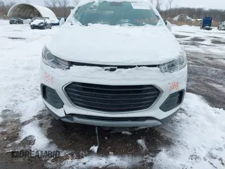 2020 Chevrolet Trax LT with VIN KL7CJLSB3LB072231, listed as a IAAI auction lot 41293558 with 58,297 mi miles and . Bid and sale history available at DreamBid. Image 6.