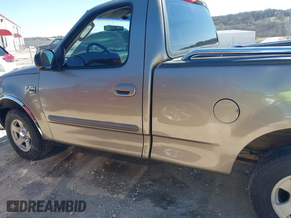 2003 Ford F-150 XL with VIN 1FTRF17W33NA33247, listed as a IAAI auction lot 41815581 with 171,256 mi miles and . Bid and sale history available at DreamBid. Image 14.