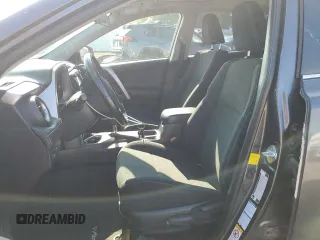 2016 Toyota RAV4 XLE with VIN JTMRFREV0GJ082234, listed as a Copart auction lot 64941855 with 193,270 mi miles and Salvage title. Bid and sale history available at DreamBid. Image 7.