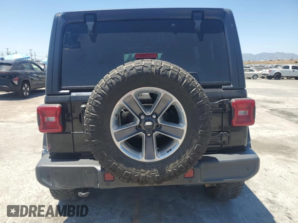 2020 Jeep Wrangler Unlimited Sahara with VIN 1C4HJXEN9LW247869, listed as a Copart auction lot 62697245 with 100,982 mi miles and Salvage title. Bid and sale history available at DreamBid. Image 6.