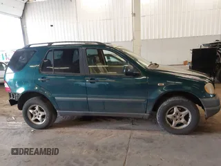 1998 Mercedes-Benz M-Class with VIN 4JGAB54E1WA011086, listed as a IAAI auction lot 41534717 with 186,273 mi miles. Bid and sale history available at carsss.com. Image 13.