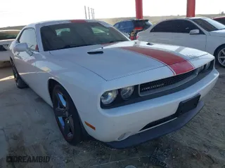 2014 Dodge Challenger SXT with VIN 2C3CDYAG3EH115338, listed as a IAAI auction lot 41323473 with 89,626 mi miles. Bid and sale history available at carsss.com. Image 1.