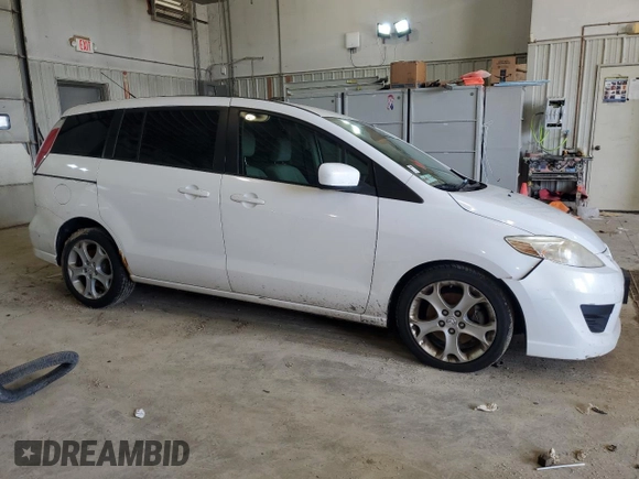 2010 Mazda 5 Sport with VIN JM1CR2W3XA0374407, listed as a Copart auction lot 61870014 with 196,210 mi miles and Salvage Title. Bid and sale history available at DreamBid. Image 4.