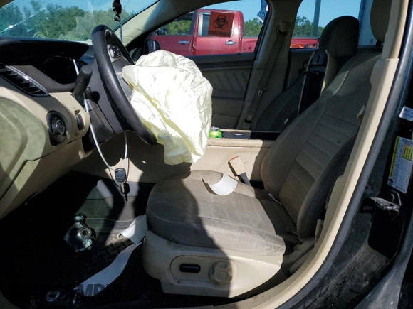 2014 Ford Taurus SE with VIN 1FAHP2D89EG149134, listed as a Copart auction lot 52363465 with 184,252 mi miles and Salvage Title. Bid and sale history available at carsss.com. Image 7.