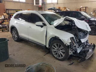 2021 Mazda CX-9 Signature with VIN JM3TCBEY3M0509978, listed as a IAAI auction lot 41690773 with 65,418 mi miles. Bid and sale history available at carsss.com. Image 1.