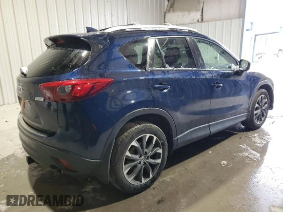 2016 Mazda CX-5 Grand Touring with VIN JM3KE4DY9G0708024, listed as a Copart auction lot 44689995 with 113,002 mi miles and Salvage Title. Bid and sale history available at DreamBid. Image 3.