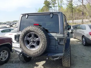 2019 Jeep Wrangler Unlimited Sport Altitude with VIN 1C4HJXDG3KW639148, listed as a IAAI auction lot 41933844 with 57,184 mi miles and . Bid and sale history available at DreamBid. Image 16.