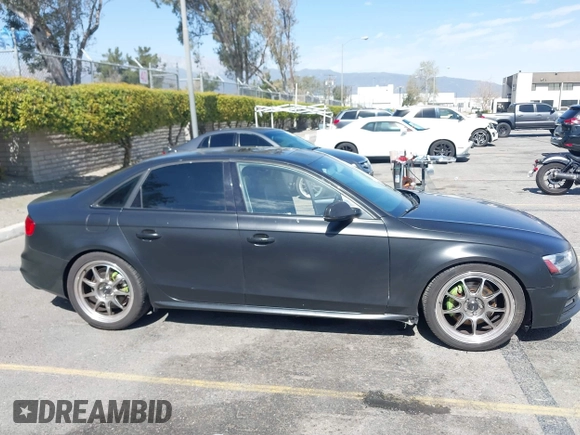 2016 Audi A4 Premium with VIN WAUAFAFL0GN016185, listed as a IAAI auction lot 41691573 with 81,501 mi miles. Bid and sale history available at carsss.com. Image 13.