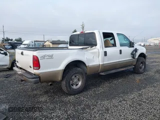 2000 Ford Super Duty F-250 XL with VIN 1FTNW21F8YEA59623, listed as a IAAI auction lot 41263825 with 371,405 mi miles. Bid and sale history available at carsss.com. Image 4.