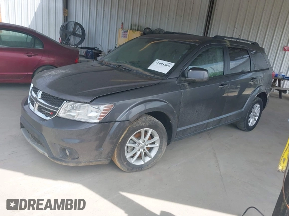 2014 Dodge Journey SXT with VIN 3C4PDCBB3ET144042, listed as a IAAI auction lot 42095860 with 154,847 mi miles. Bid and sale history available at carsss.com. Image 2.
