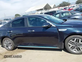 2020 Kia Optima Hybrid EX with VIN KNAGU4LE3L5037713, listed as a IAAI auction lot 42011066 with 93,335 mi miles. Bid and sale history available at carsss.com. Image 13.