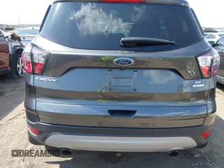 2017 Ford Escape SE z VIN 1FMCU0GD9HUD28110, wystawiony jako IAAI lot #41903505 z przebiegiem 66 808 mil mil oraz . Historia ofert i sprzedaży dostępna na DreamBid. Obrazek 17.