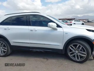 2022 Cadillac XT4 FWD Sport with VIN 1GYFZER44NF164899, listed as a IAAI auction lot 42152554 with 8,058 mi miles and . Bid and sale history available at carsss.com. Image 14.