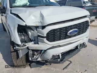 2023 Ford F-150 XL with VIN 1FTEW1C54PFB59130, listed as a IAAI auction lot 41072260 with 45,972 mi miles and . Bid and sale history available at DreamBid. Image 19.