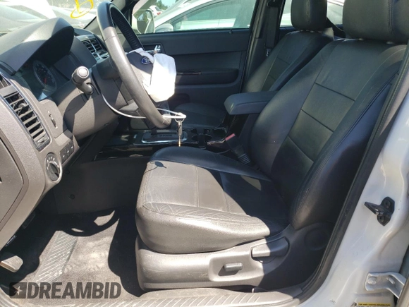 2010 Ford Escape Limited with VIN 1FMCU9EG5AKA70316, listed as a Copart auction lot 62413205 with 106,936 mi miles and Salvage title. Bid and sale history available at DreamBid. Image 7.