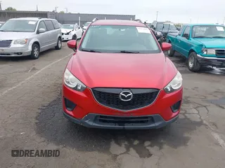 2015 Mazda CX-5 Sport z VIN JM3KE2BE9F0452625, wystawiony jako IAAI lot #42114867 z przebiegiem 167 849 mil mil oraz . Historia ofert i sprzedaży dostępna na DreamBid. Obrazek 11.