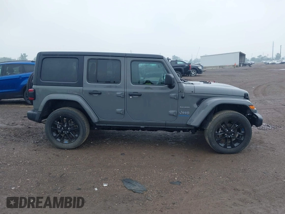 2023 Jeep Wrangler Sahara with VIN 1C4JJXP6XPW698886, listed as a IAAI auction lot 42439690 with 41,787 mi miles and . Bid and sale history available at DreamBid. Image 13.