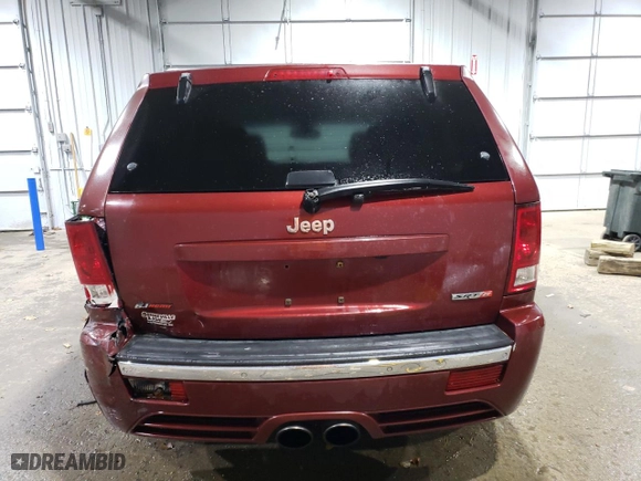 2007 Jeep Grand Cherokee SRT-8 with VIN 1J8HR78357C509051, listed as a Copart auction lot 79013524 with 161,580 mi miles and Salvage Title. Bid and sale history available at carsss.com. Image 6.