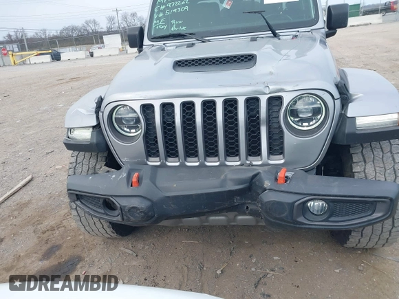 2021 Jeep Gladiator Mojave with VIN 1C6JJTEG9ML519309, listed as a IAAI auction lot 41701544 with 64,461 mi miles and . Bid and sale history available at DreamBid. Image 12.